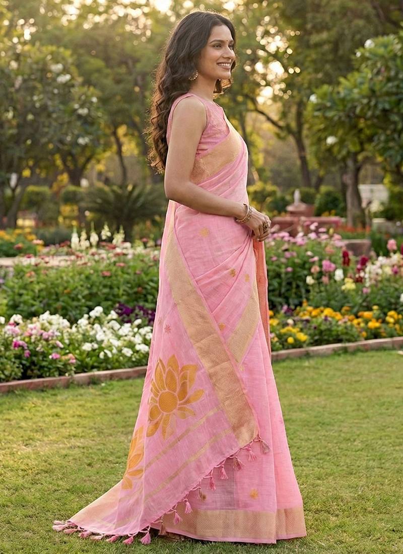 Light pink linen cotton blend saree with floral woven pallu & zari border