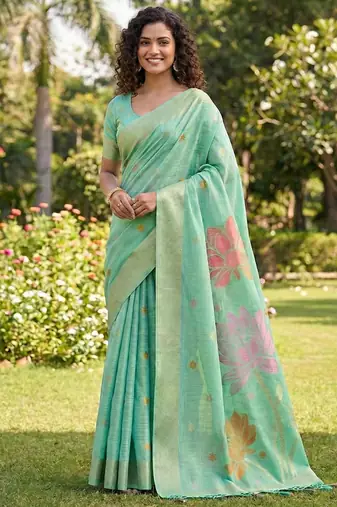 Sea green linen cotton blend saree with floral woven pallu & zari border