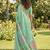 Sea green linen cotton blend saree with floral woven pallu & zari border