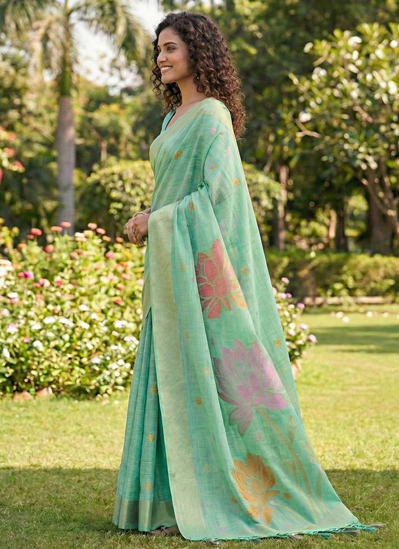 Sea green linen cotton blend saree with floral woven pallu & zari border