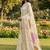 Off white linen cotton blend saree with floral woven pallu & zari border