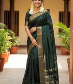 Dark green silk blend saree with silver zari horse motif