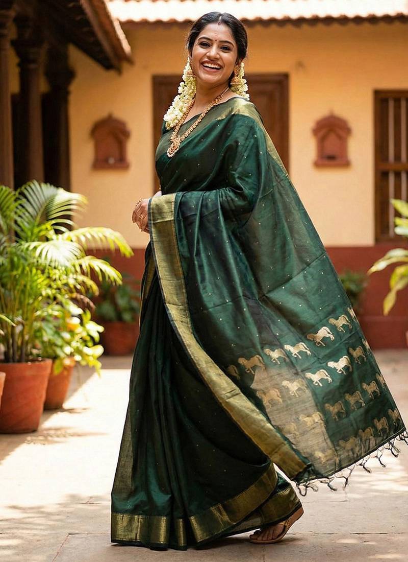Dark green silk blend saree with silver zari horse motif