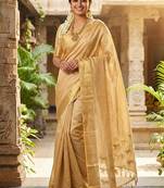 Beige silk blend saree with silver zari horse motif