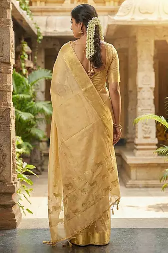 Beige silk blend saree with silver zari horse motif
