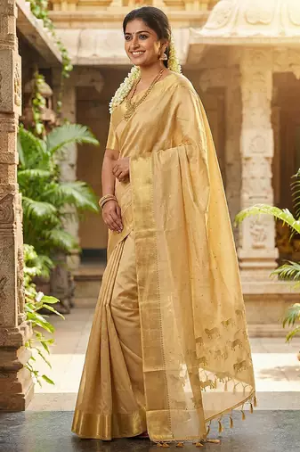Beige silk blend saree with silver zari horse motif