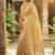 Beige silk blend saree with silver zari horse motif