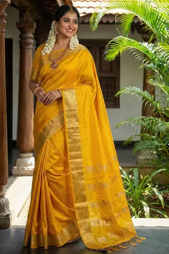 Mustard silk blend saree with silver zari horse motif
