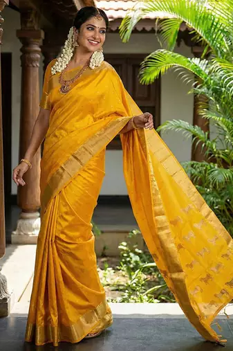 Mustard silk blend saree with silver zari horse motif