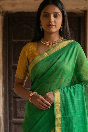 Green cotton silk blend saree with contrasting border