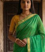 Green cotton silk blend saree with contrasting border