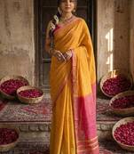 Orange cotton silk blend saree with contrasting border
