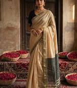 Beige cotton silk blend saree with contrasting border
