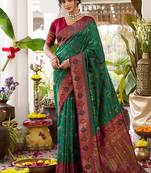 Green soft banarasi silk blend saree with contrast blouse piece