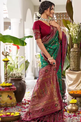 Green soft banarasi silk blend saree with contrast blouse piece