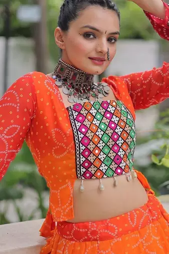 Orange Bandhani Free Size Stitched Navratri Lehenga Choli with Kutchi Gamthi Patche work
