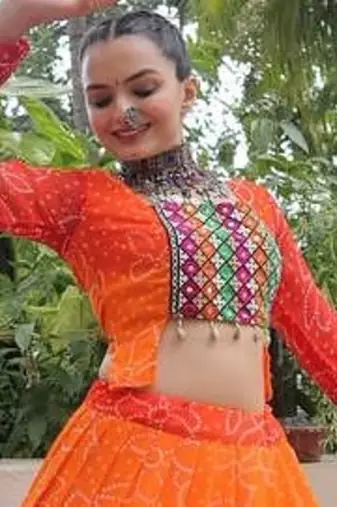 Orange Bandhani Free Size Stitched Navratri Lehenga Choli with Kutchi Gamthi Patche work