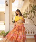 Orange silk blend Free Size Stitched Lehenga Choli with Foil Embroidery & Printed Work