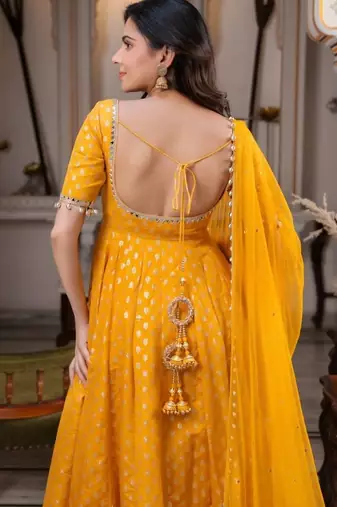 Yellow chanderi jacquard anarkali suit with mirror work