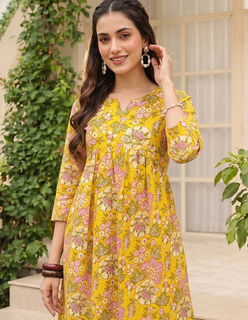 Women cotton blend yellow floral digital printed regular kurta