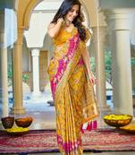 Mustard yellow soft silk blend woven saree with rich zari border & traditional heritage motifs