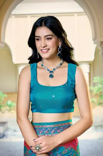 Turquoise blue soft silk blend woven saree with rich zari border & traditional heritage motifs