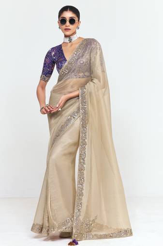 Beige designer fancy embroidered party wear saree with art silk blend blouse