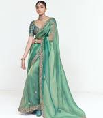 Sea green designer fancy embroidered party wear saree with art silk blend blouse