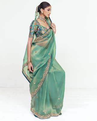 Sea green designer fancy embroidered party wear saree with art silk blend blouse 4