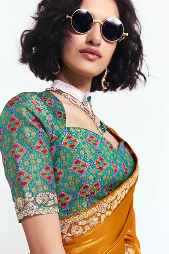 Orange designer fancy embroidered party wear saree with art silk blend blouse