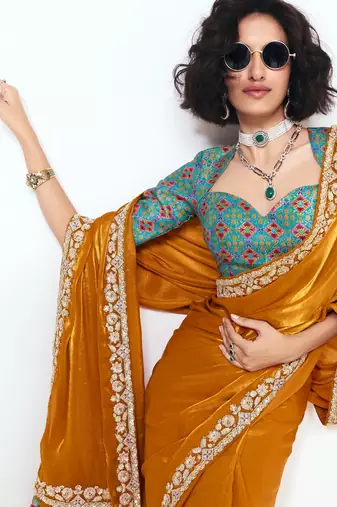 Orange designer fancy embroidered party wear saree with art silk blend blouse
