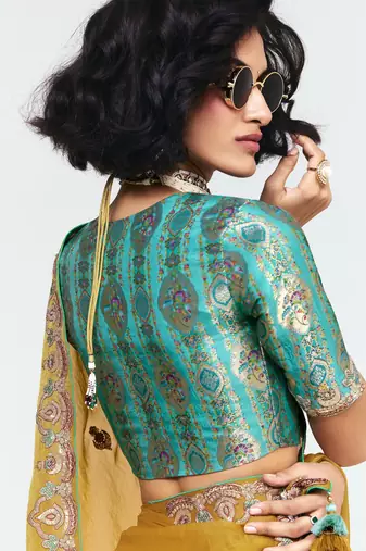 Yellow designer fancy embroidered party wear saree with art silk blend blouse