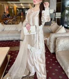 Cream heavy natural silk palazzo set with pearl moti hand work