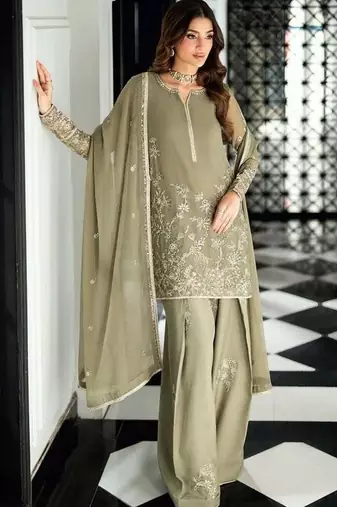 Pakistani light green georgette palazzo suit with sequins work