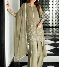 Pakistani light green georgette palazzo suit with sequins work