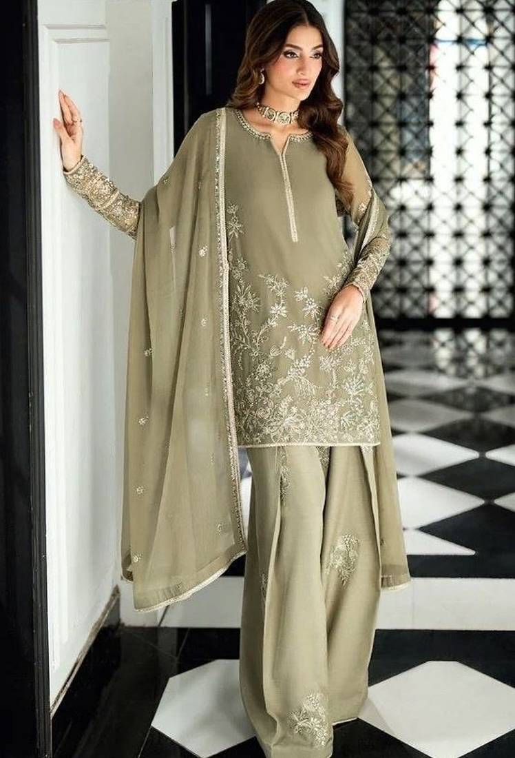 Pakistani light green georgette palazzo suit with sequins work