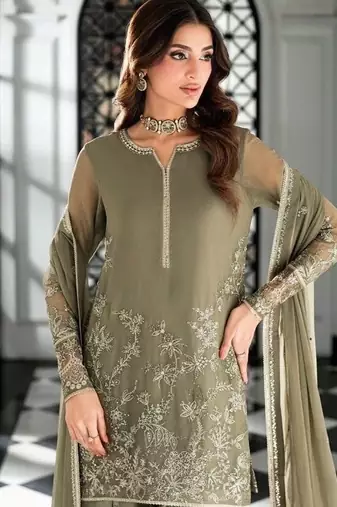 Pakistani light green georgette palazzo suit with sequins work