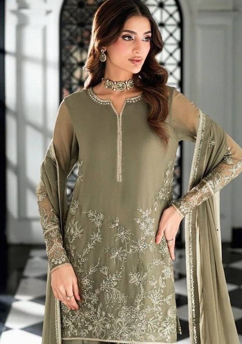 Pakistani light green georgette palazzo suit with sequins work