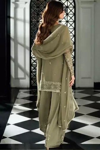 Pakistani light green georgette palazzo suit with sequins work