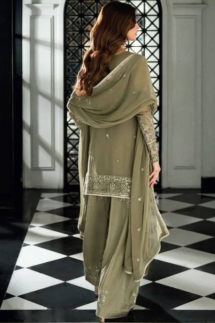 Pakistani light green georgette palazzo suit with sequins work