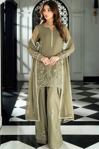 Pakistani light green georgette palazzo suit with sequins work