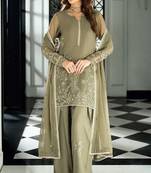 Pakistani light green georgette palazzo suit with sequins work