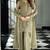 Pakistani light green georgette palazzo suit with sequins work