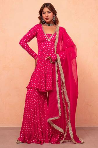 Rani pink jacquard chanderi kurta sharara set with net dupatta