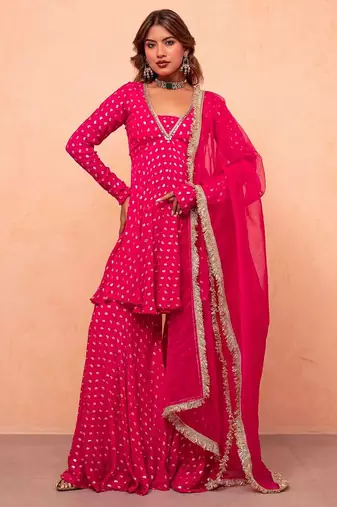 Rani pink jacquard chanderi kurta sharara set with net dupatta