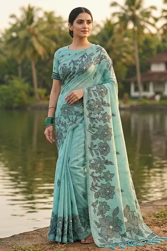 Sky blue floral printed linen blend saree with matching blouse piece