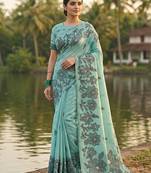 Sky blue floral printed linen blend saree with matching blouse piece