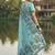 Sky blue floral printed linen blend saree with matching blouse piece
