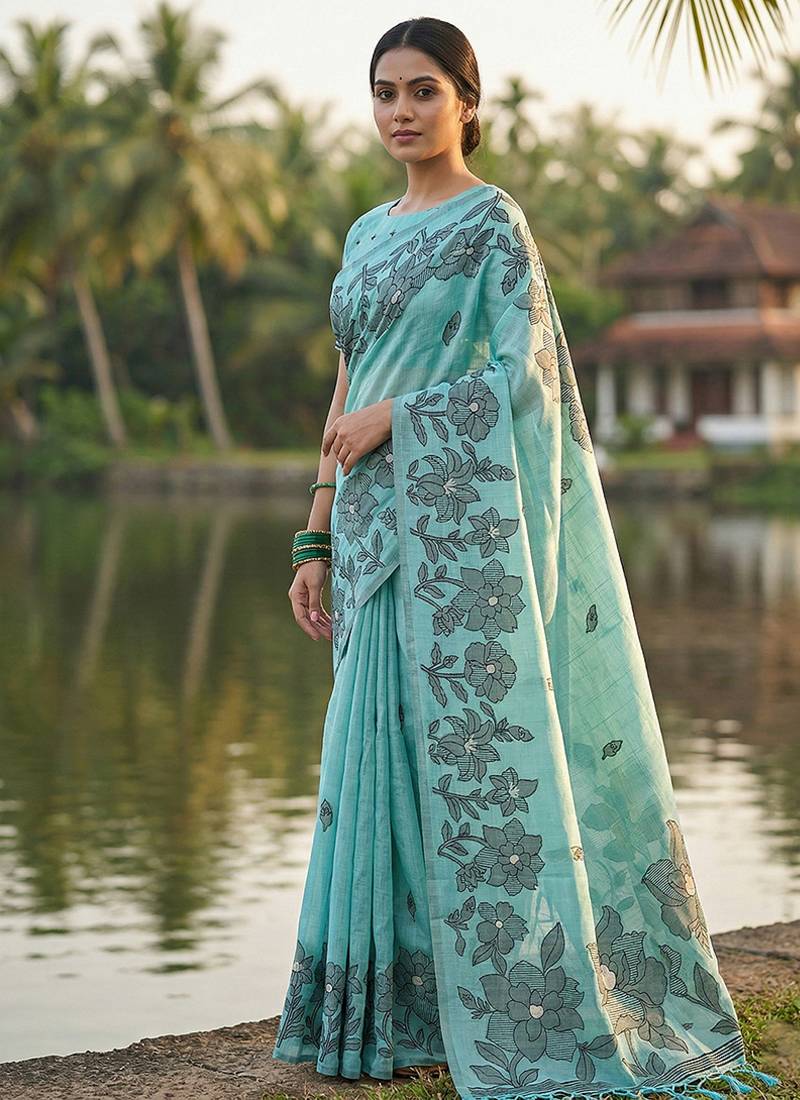 Sky blue floral printed linen blend saree with matching blouse piece