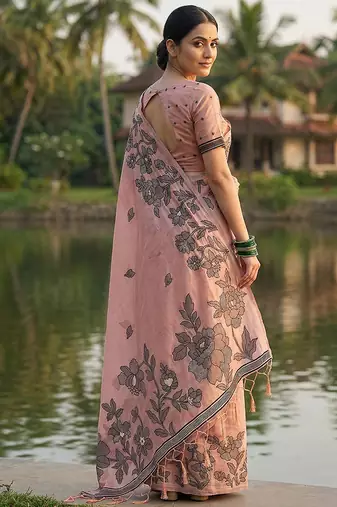 Peach floral printed linen blend saree with matching blouse piece